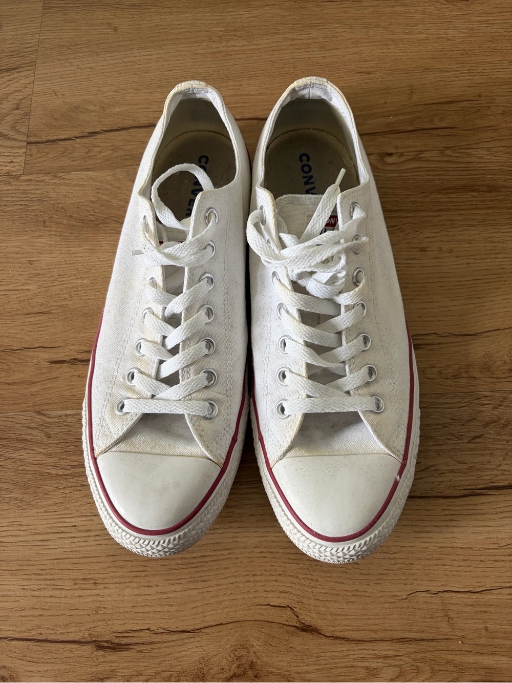 Converse Low Top Canvas Sneakers in White with Red Stripe